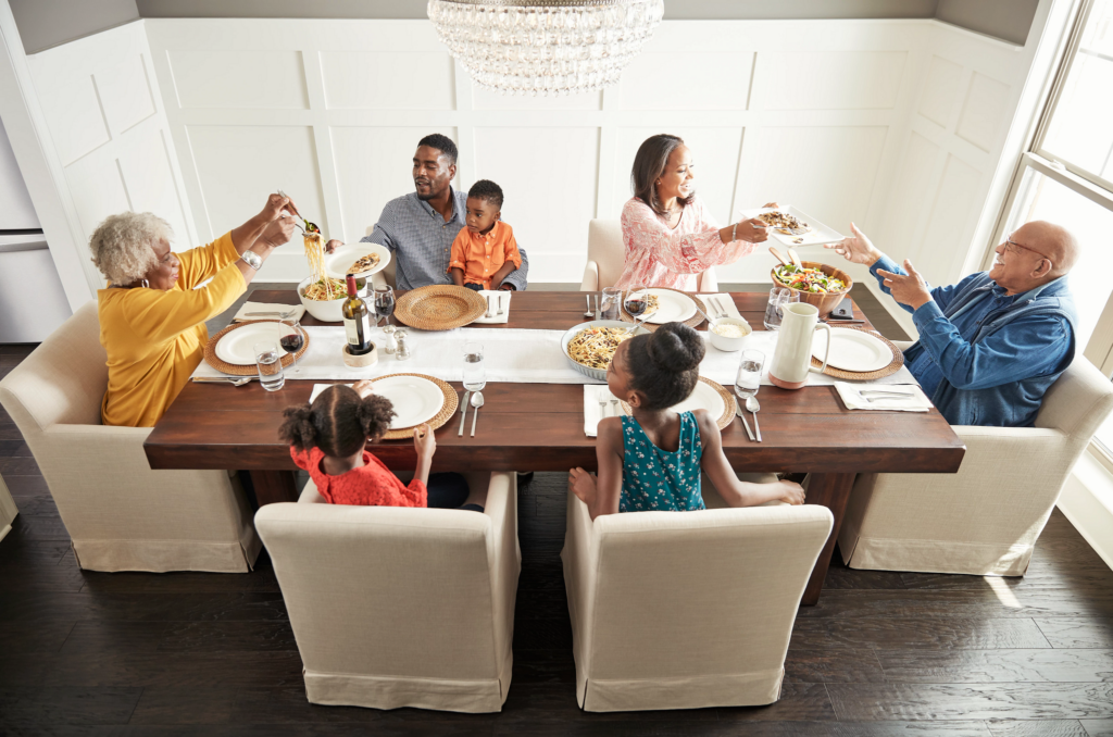 Family having breakfast at the dining table | Colonial Interiors
